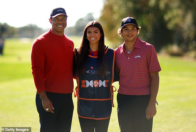 Woods avec ses enfants.
