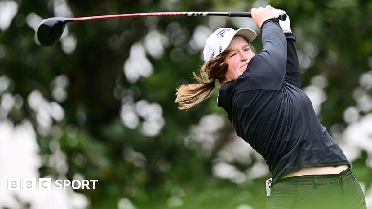 Lottie Woad swings a golf club