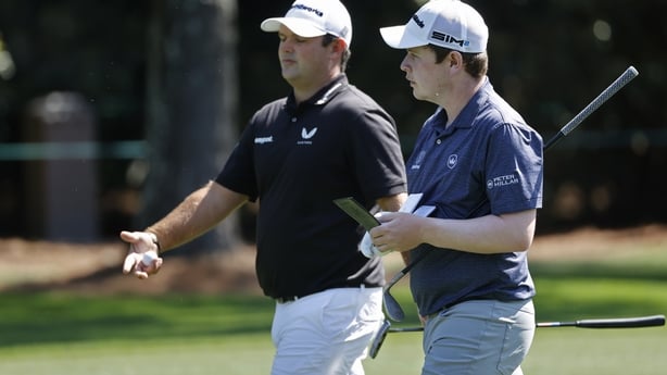 Robert MacIntyre of Scotland and Masters champion Patrick Reed walk hole No. 1 during Practice Round 1 for the Masters at Augusta National Golf Club, Monday, April 5, 2021. (Photo by Augusta National via Getty Images)