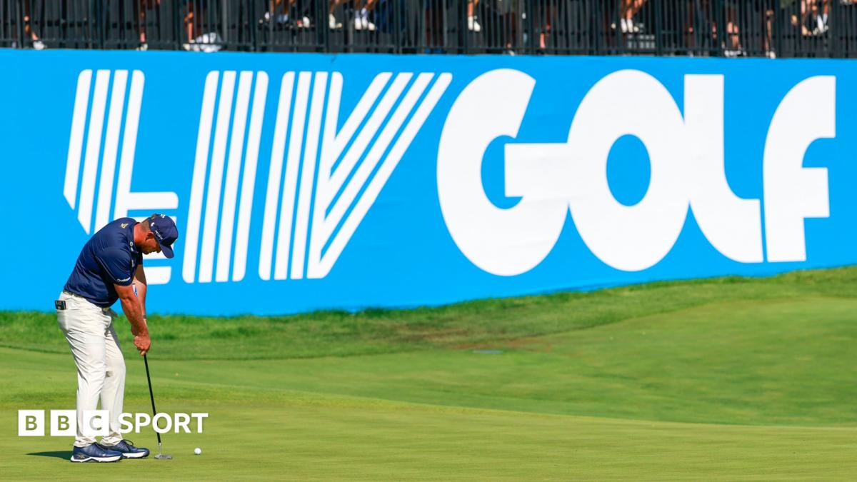 Golfer Bryson DeChambeau putts in front of a big blue and white LIV Golf sign