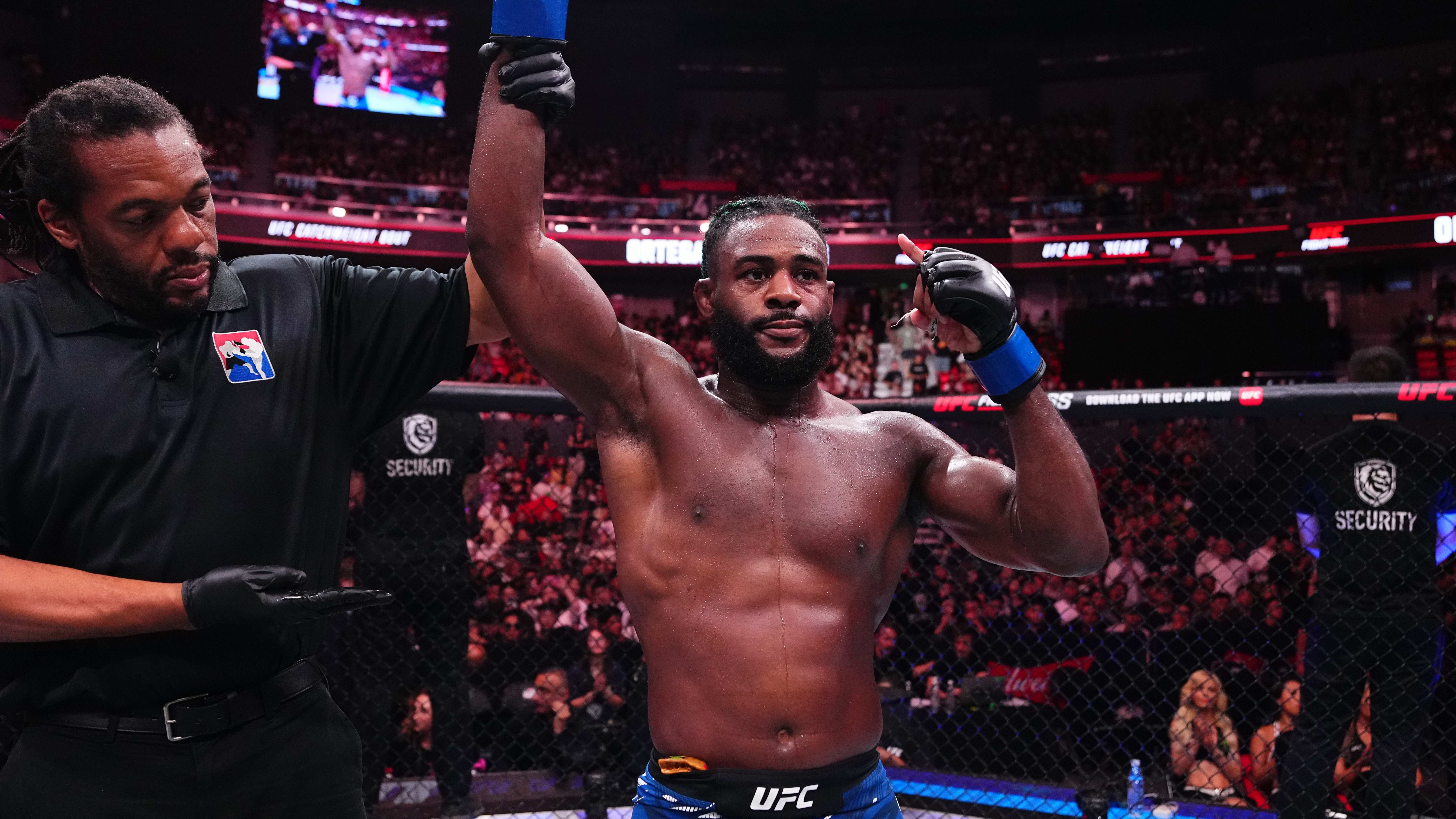 Aljamain Sterling reacts after a victory against Brian Ortega