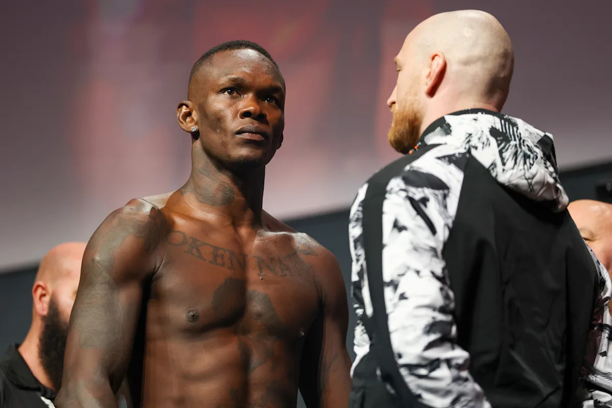 Résultats en direct de l'UFC à Seattle : Suivez le combat palpitant entre Israel Adesanya et Joe Pyfer, scores en temps réel et moments forts !